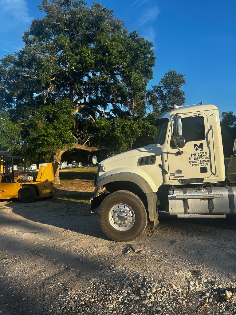 Moses Enterprise LLC Mack truck with company branding on site
